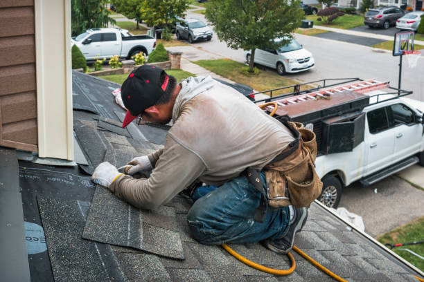 Professional Roof Replacement technician working in College Corner, OH